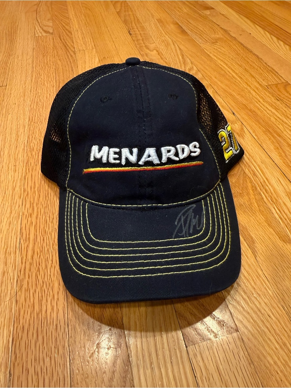 Menards Black Logo Trucker Hat with Yellow Stitching